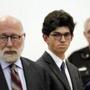 Owen Labrie (center) stood with his lawyer, J.W. Carney, before being sentenced Thursday in Merrimack County Superior Court.