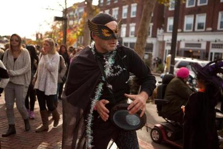 Salem, MA -- 10/31/15 -- Jeff Pearlstein drums in the downtown square of Salem,as crowds start gathering for the Halloween celebrations on October 31, 2015, in Salem, Massachusetts. (Kayana Szymczak for the Boston Globe)
