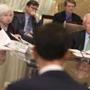 Federal Reserve Chair Janet Yellen, left, and Vice Chairman Stanley Fischer listen to a presentation during a meeting of the Board of Governors of the Federal Reserve, Friday, Oct. 30, 2015, in Washington. The meeting was to discuss a proposed rule establishing total loss-absorbing capacity and long-term debt requirements for global systemically important banking organizations, as well as a final rule on margin and capital requirements for uncleared swaps of prudentially regulated swap entities. (AP Photo/Evan Vucci)