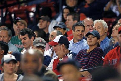 From left: Brian d'Arcy James, Gene Amoroso, Mark Ruffalo, and John Slattery at a game at Fenway Park in a scene from ?Spotlight.?
