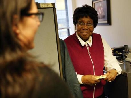 Ruth Ford posed for a portrait outside the Department of Public Health in Boston. The longest-serving employee in state government, she retired on Friday.
