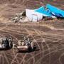 Egyptian military members approached the wreckage of the crashed passenger jet bound for St. Petersburg on Sunday.
