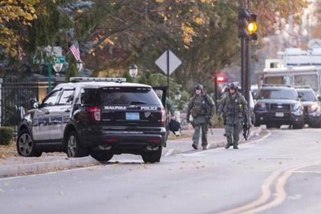 SWAT team members were on the scene in Canton early Tuesday, where a man barricaded himself inside a home on Washington Street.
