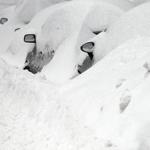 Snow-covered cars were seen in South Boston last February.