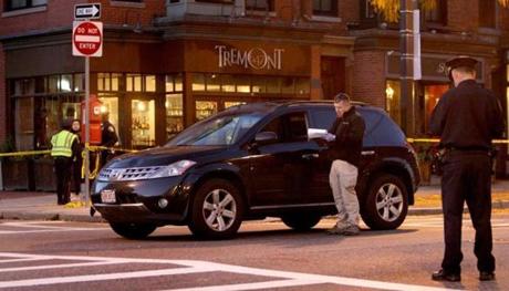 Boston, MA: 11-04-15: Boston police at the scene where a car apparently hit two pedestrians at the intersection of Tremont St. and West Brookline St. in the South End of Boston, Mass. Nov. 4, 3015. Photo/John Blanding, Boston Globe staff story/Jill Ramos, Metro ( 05southend )
