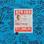 A reward sign and messages hung near where Tyshawn Lee was fatally shot.