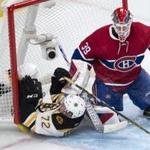 Frank Vatrano, who scored in his NHL debut, slid into the net next to the Canadiens? Mike Condon during the second period.