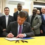 Mayor Martin J. Walsh signed an ordinance banning replica handguns in public spaces on Monday. 