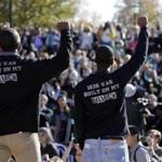 University of Missouri student protesters, in shirts referencing the school?s founding, addressed a crowd in Columbia after president Timothy Wolfe resigned.