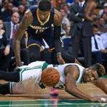 11/11/15: Boston, MA: The Celtics Marcus Smart lost control of the ball and the Pacers Paul George (rear) was there to pounce on it in the second quarter. The Boston Celtics hosted the Indiana Pacers in a regular season NBA basketball game at the TD Garden. (Globe Staff Photo/Jim Davis) section:sports topic:celticspacers