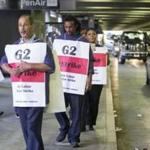 Airport workers held a picket line outside of Terminal B at Logan Airport in August.