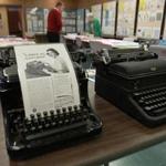 Vintage typewriters displayed at the Spellman Museum of Stamps and Postal History help tell the story of the secretarial school started by Katharine Gibbs. 