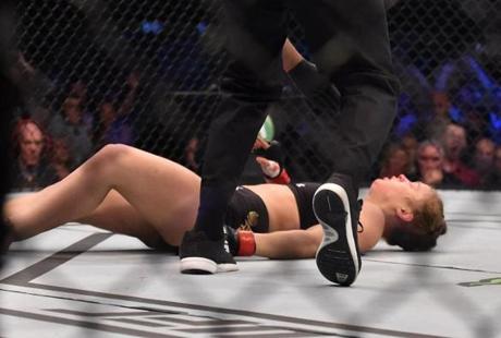 Ronda Rousey hit the canvas Sunday after she was knocked out by Holly Holm.
