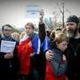 Boston, MA - 11/15/2015 - L-R Cyril Dayon, Loris Boichot, Erick Carpenter and son Gibson Carpenter participate in a rally to show solidarity with France in the wake of the recent Paris terrorist in Boston, MA, November 15, 2015. (Keith Bedford/Globe Staff) 