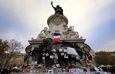 Flowers and tributes to the victims of Friday?s attacks were left at the Place de la Republique in Paris on Monday.
