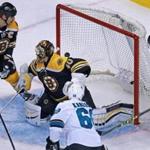 11/17/15: Boston, MA: With Zdeno Chara at left and Patrice Bergeron at right, the Sharks Melker Karlsson (68) still puts the puck behind Bruins goalie Tuukka Rask for a second period goal. The Boston Bruins hosted the San Jose Sharks in a regular season NHL hockey game at the TD Garden. (Globe Staff Photo/Jim Davis) section:sports topic:Bruins-Sharks (1)