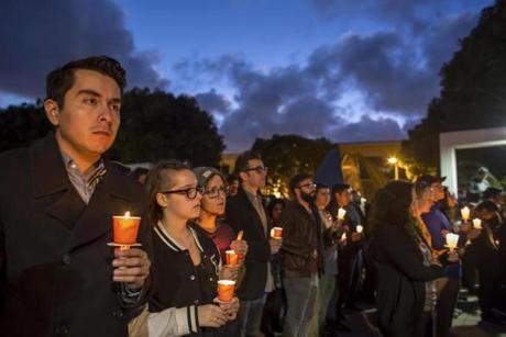 Mourners at a vigil for Nohemi Gonzalez, a California State University-Long Beach student killed in the Paris terrorist attacks Friday, in Long Beach, Calif., Nov. 15, 2015. Fridayâ??s terrorist attacks killed 129 people and injured about 350 others. (Monica Almeida/The New York Times)
