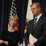 Health and Human Services Secretary Marylou Sudders (left) and Governor Charlie Baker conferred during Tuesday?s press conference.