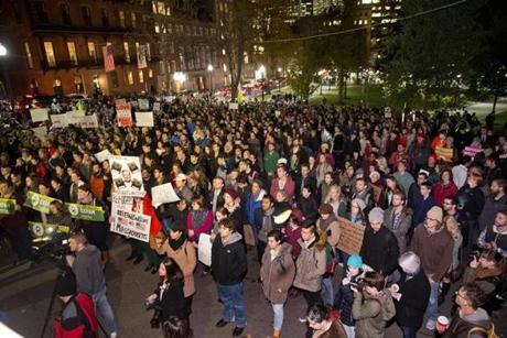 Boston MA 11/20/15 More than 1,000 people protesting Mass Gov. Charlie Baker's position against allowing Syrian refugees into the state on the steps in the Boston Common in front of the State House on Friday November 20, 2015. (Matthew J. Lee/Globe staff) Topic: Reporter: 
