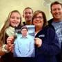 Hingham 11/02/2015: University of San Diego freshman Tom Noonan's family: (l-R) Meredith Noonan, 15, Jack, 18, mother Mal and father Phil with a picture of Tom. Photo by Debee Tlumacki for the Boston Globe (regional) 