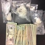 Officers found 72 grams of cocaine, 5 grams of heroin, and $627 in cash from an apartment on Acushnet Avenue.