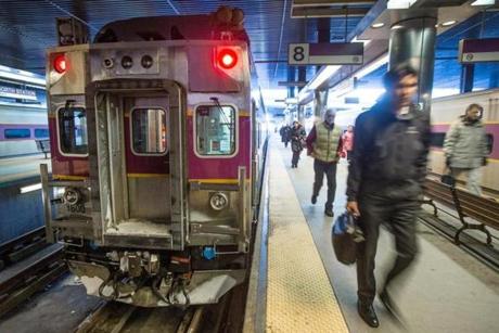 12/11/2013 BOSTON, MA Passengers enter North Station (cq) after riding on the MBTA's Fitchburg/South Acton Commuter Rail line. (Aram Boghosian for The Boston Globe) 
