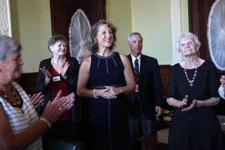  9/17/15-- BOSTON -Doric Docents applaud Lauren Baker, First Lady of the Commonwealth after she gave brief remarks in the House Members Lounge at the State House. As First Lady Mrs. Baker is the president of the Doric Docents, who give tours at the State House.(globe staff photo :Joanne Rathe reporter: shirley leung topic: section: business ) 
