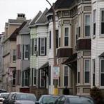Multifamily homes, like these in South Boston, are selling for premium prices.