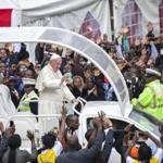 Pope Francis waved to the crowd at the University of Nairobi. 