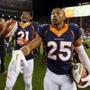 Denver Broncos cornerback Chris Harris (25) and Denver Broncos cornerback Aqib Talib (21) celebrate after an NFL football game against the Green Bay Packers, Sunday, Nov. 1, 2015, in Denver. The Broncos won 29-10 to improve to 7-0. (AP Photo/Joe Mahoney) 