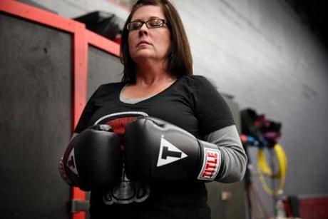 After Catherine Fennelly of Quincy lost her son to an overdose this year, she started a boxing group called Let It Out. 
