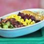 Piggery bowl features spinach, bacon, corn, pickled beets, garlic panko crumbs, and brown rice, 