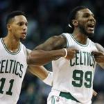 Boston Celtics' Jae Crowder (99) reacts in front of teammate Evan Turner (11) after making the go-ahead basket during the fourth quarter of an NBA basketball game against the Philadelphia 76ers in Boston, Wednesday, Nov. 25, 2015. The Celtics won 84-80. (AP Photo/Michael Dwyer)
