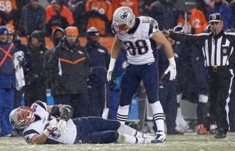 Teammate Scott Chandler checked on Gronkowski before medical personnel arrived.
