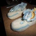 A pair of baby slippers was mailed from Cambridge to Colorado more than 50 years ago.