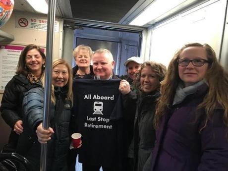 Commuters on Train 510 threw a retirement party for commuter rail engineer Bill McEnery Tuesday.
