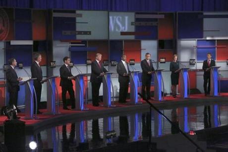 Eight candidates on stage for the Republican debate at the Milwaukee Theatre in Milwaukee, Nov. 10, 2015. From left: Gov. John Kasich, Jeb Bush, Sen. Marco Rubio, Donald Trump, Ben Carson, Sen. Ted Cruz, Carly Fiorina and Sen. Rand Paul. (Michael Appleton/The New York Times)
