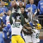 Packers tight end Richard Rodgers (82) reaches to catch the winning pass on the last play against the Lions.