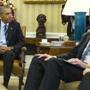 President Barack Obama sat with FBI director James Comey in the Oval Office of the White House in Washington, before making a statement on the mass shooting in San Bernandino. 