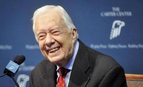 Former U.S. President Jimmy Carter takes questions from the media during a news conference about his recent cancer diagnosis and treatment plans, at the Carter Center in Atlanta, Georgia, in this file photo taken August 20, 2015. Carter told a Sunday School class at his church in Georgia that his cancer was gone, the Atlanta Journal-Constitution reported on Sunday, citing a church member. REUTERS/John Amis/Files
