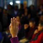 A child raised her hand to ask a question during Sunday?s meeting.