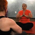 Myrna Gomez-Soto participates in a yoga session for women in breast cancer treatment at Stil Studio in Dedham. 