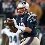 Patriots quarterback Tom Brady ran along the sideline after catching a third-quarter pass from Danny Amendola.