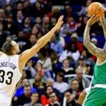 Celtics guard Isaiah Thomas (right) shoots over Ryan Anderson during the second quarter Monday in New Orleans.