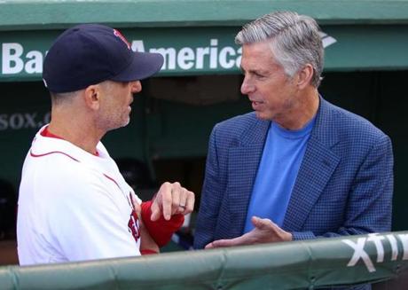 Boston- 09/26/15 - Red Sox vs Orioles- Sox interim manager Torey Lovullo chats with Sox executive Dave Dombrowski in the dugout before the game.Boston Globe staff photo by John Tlumacki(sports)
