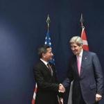 Secretary of State John Kerry (right) and Singapore's Foreign Minister Vivian Balakrishnan shook hands Wednesday. 