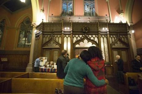 Candles were lit Sunday at the Church of the Covenant in Boston to honor lost children.
