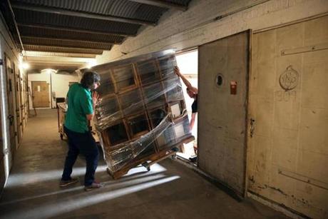 Movers emptied a unit at sprawling Metropolitan Storage in Cambridge.
