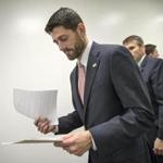 House Speaker Paul Ryan of Wisconsin looked over his notes before a news conference on Capitol Hill in Washington, Wednesday. 
