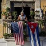 Javier Yanez stood on his balcony decorated with U.S. and Cuban flags in Old Havana, Cuba. 